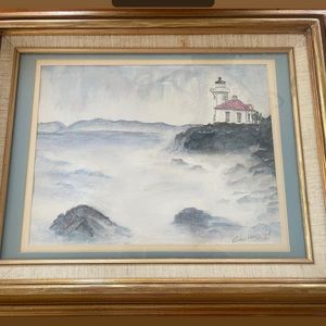 Original vintage watercolor.Signed. Vintage wood frame and linen mat. Coastal